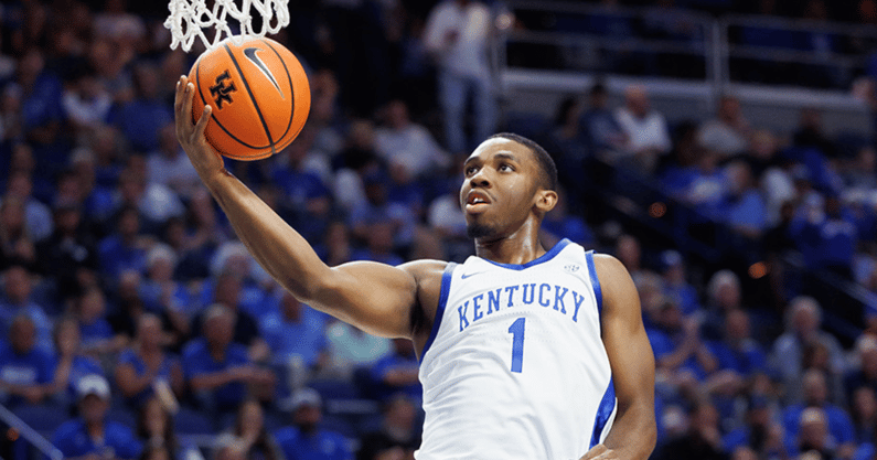 Lamont Butler finishes at the basket for the Kentucky Wildcats